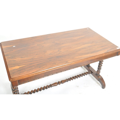 6 - A William IV 19th century rosewood library / writing table desk. Raised on shaped bobbin turned legs... 