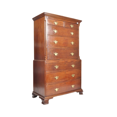 7 - A 19th century George III mahogany chest on chest of drawers. Raised on bracket feet with a series o... 