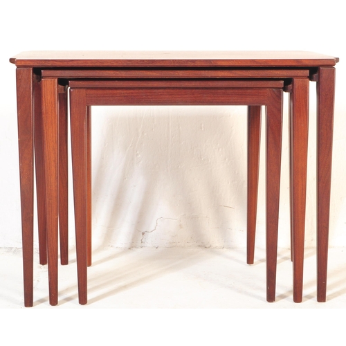 557 - A retro vintage mid 20th century teak wood nest of graduating tables designed by Richard Hornby for ... 