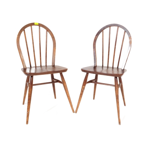 571a - A pair of retro vintage mid 20th century Ercol beech and elm dining chairs having hoop back with spi... 