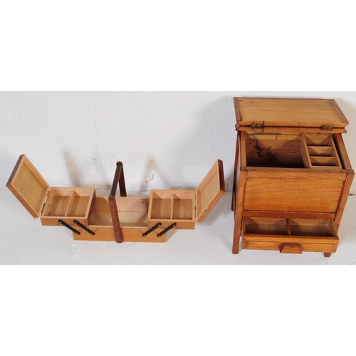 572a - An early 20th century circa. 1920's sewing box alongside a retro mid 20th century circa. 1960's teak... 