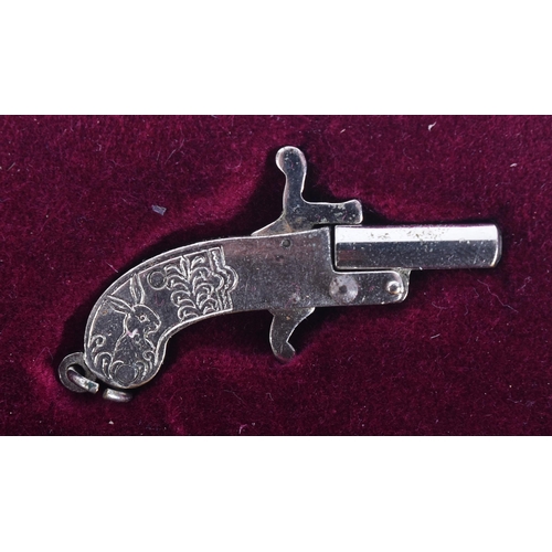 12 - A late 19th / early 20th Century continental 2mm obsolete calibre miniature pinfire pistol / charm p... 