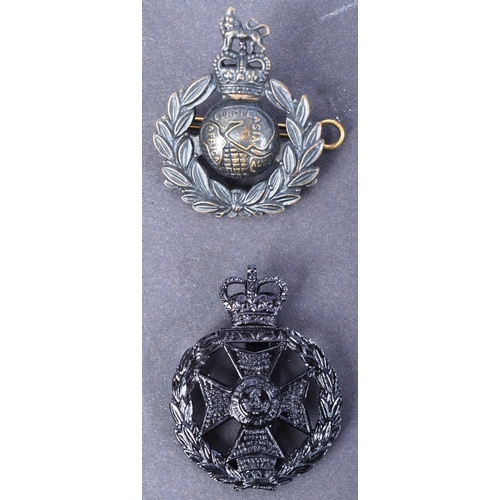 131 - A collection of x10 post WWII Second World War British Army cap badges to include; Royal Marines, Th... 