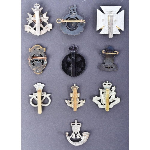 131 - A collection of x10 post WWII Second World War British Army cap badges to include; Royal Marines, Th... 