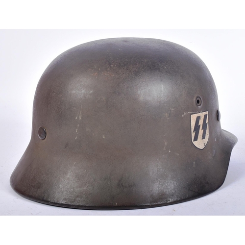 150 - An original WWII Second World War Third Reich Nazi German SS Officers M42 Stahlhelm steel helmet. A ... 