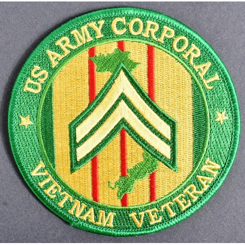 151 - An original US United States Armed Forces Vietnam War Service medal along with a US Army Corporal pa... 