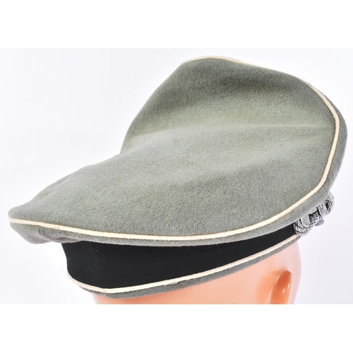 170 - A WWII Second World War related Third Reich Nazi German Waffen SS Officer's peaked cap. The green fe... 