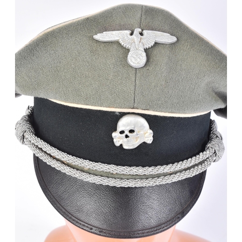 170 - A WWII Second World War related Third Reich Nazi German Waffen SS Officer's peaked cap. The green fe... 