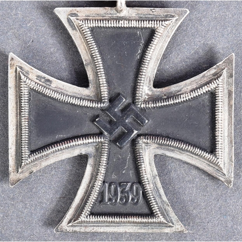 173 - A WWII Second World War Third Reich Nazi German Iron Cross medal. A Second Class example of two part... 