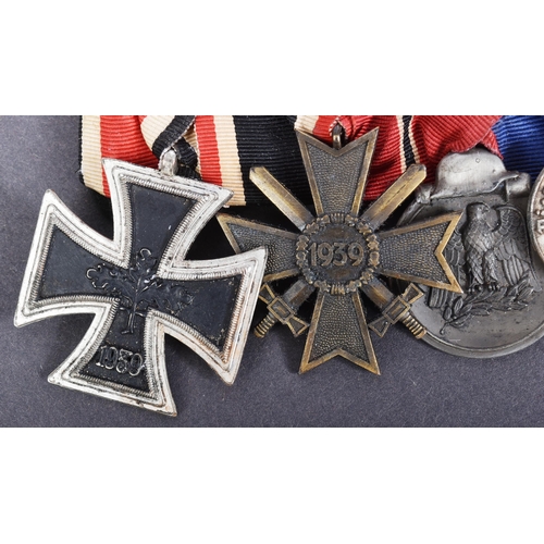 192 - A post WWII Second World War 1950s German Third Reich de-Nazified medal group. Medals comprising Iro... 