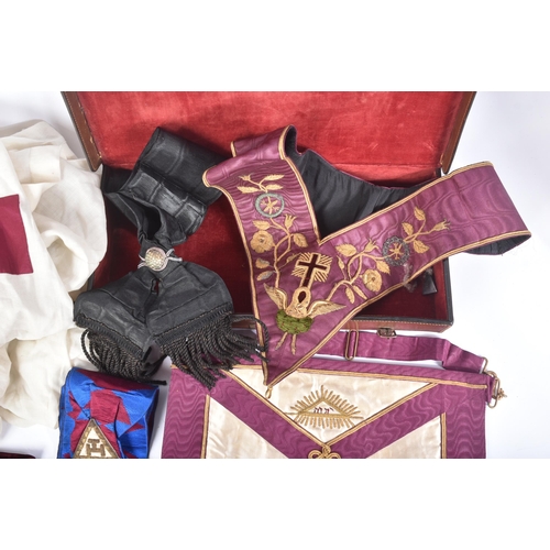 197 - An original Masonic Knights Templar uniform regalia comprising mantle and tunic, maroon velvet cap, ... 