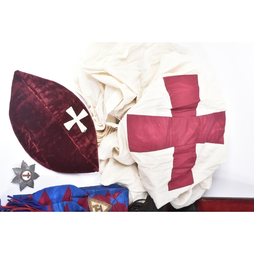 197 - An original Masonic Knights Templar uniform regalia comprising mantle and tunic, maroon velvet cap, ... 