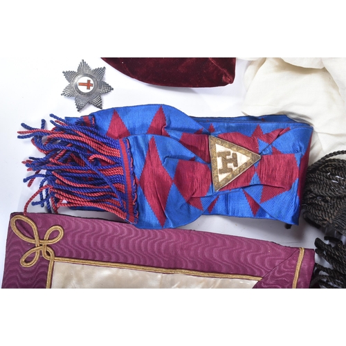 197 - An original Masonic Knights Templar uniform regalia comprising mantle and tunic, maroon velvet cap, ... 