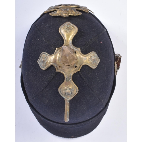 20 - A 19th century Victorian Boer War period Connaught Rangers helmet. Blue cloth example with Victorian... 