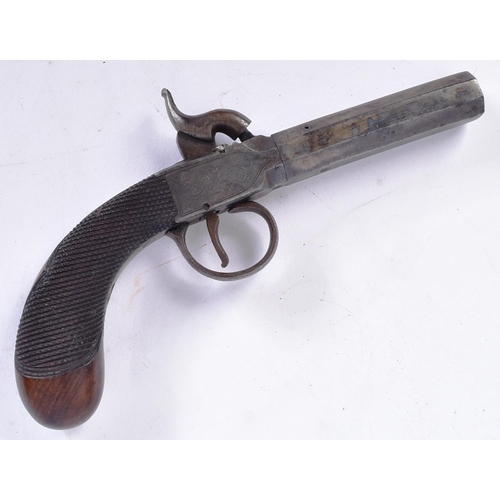 25 - A 19th Century Victorian ladies pocket pistol / muff gun. Wooden stock with chequered grip, scrollin... 