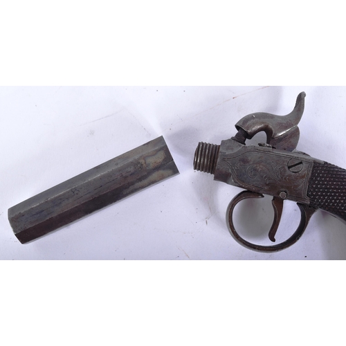 25 - A 19th Century Victorian ladies pocket pistol / muff gun. Wooden stock with chequered grip, scrollin... 