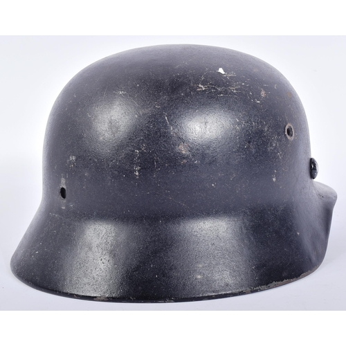 205 - A WWII Second World War Third Reich Nazi German Luftwaffe Officers M40 Stahlhelm helmet. The black h... 