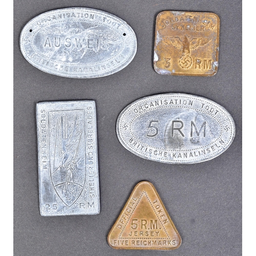 222 - A collection of WWII Second World War Third Reich Nazi German style Channel Island occupation tokens... 