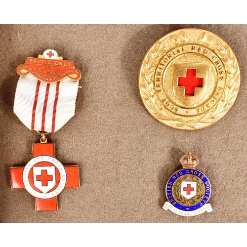 231 - Red Cross / Nursing Interest - a collection of vintage Red Cross and Nursing related badges and meda... 