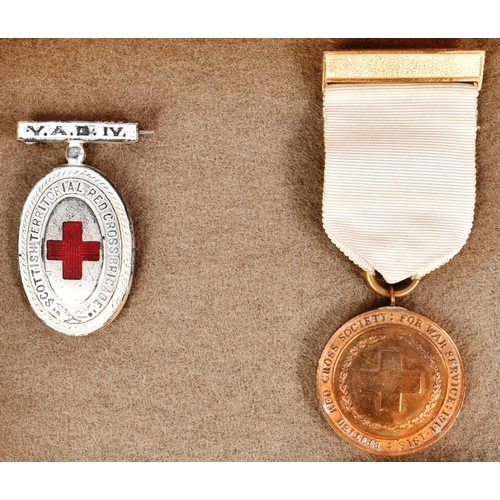 231 - Red Cross / Nursing Interest - a collection of vintage Red Cross and Nursing related badges and meda... 