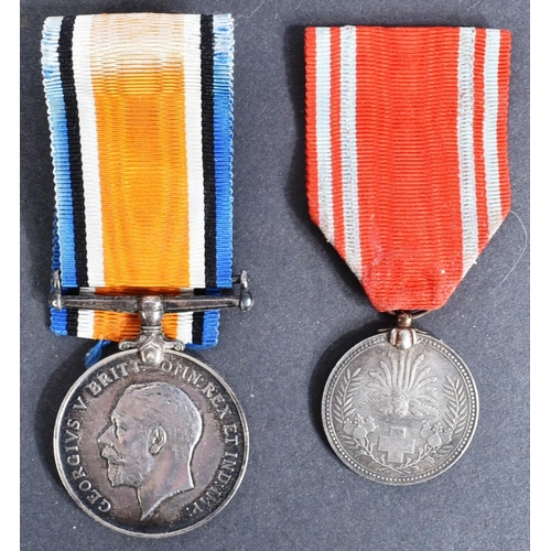 237 - Medals - a collection of assorted unrelated medals and similar items to include: a WWI First World W... 