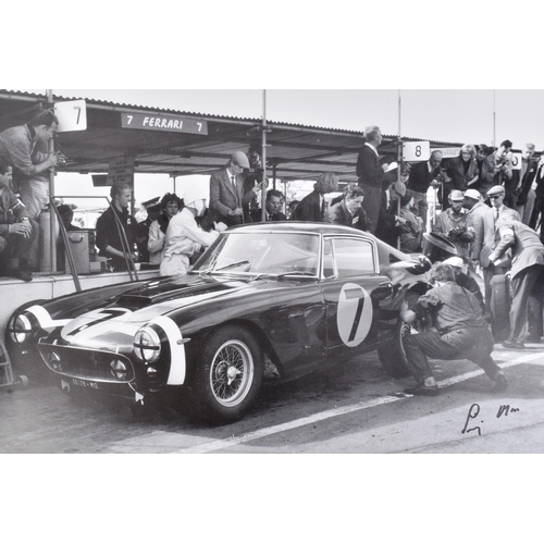 238 - Stirling Moss  - Formula One - a signed photographic print of Stirling Moss in 1961 beside his SWB F... 