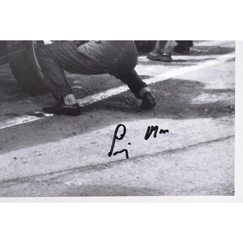 238 - Stirling Moss  - Formula One - a signed photographic print of Stirling Moss in 1961 beside his SWB F... 