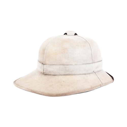 252 - An original WWII Second World War British Army Wolseley pattern tropical pith helmet. Lacking the li... 