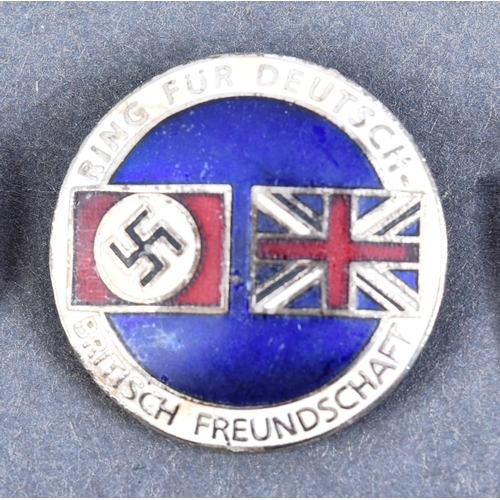 254 - A collection of x3 post-WWII Second World War British and German far right / fascist badges comprisi... 