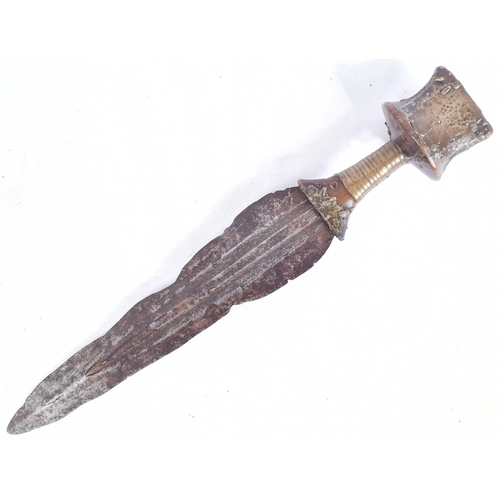 268 - A 19th Century Central African / Congolese tribal dagger. Wooden pommel covered in a copper sheet (i... 