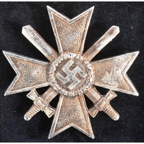 287 - A WWII Second World War Third Reich Nazi German War Merit Cross. A 1st Class Military example with c... 