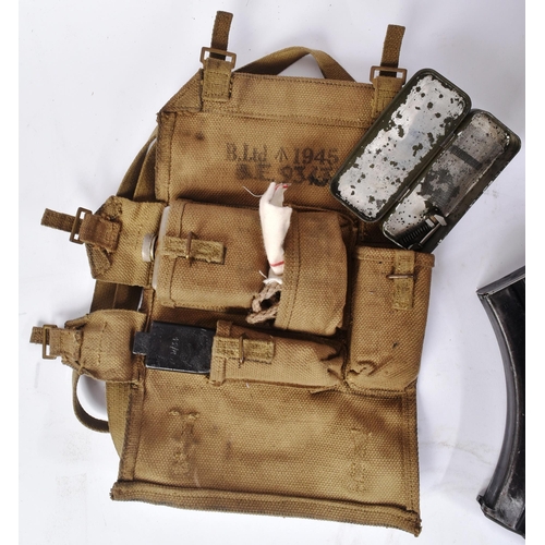 292 - A WWII Second World War British BREN Gun Magazine carrier containing x6 magazines (pouch dated 1945)... 