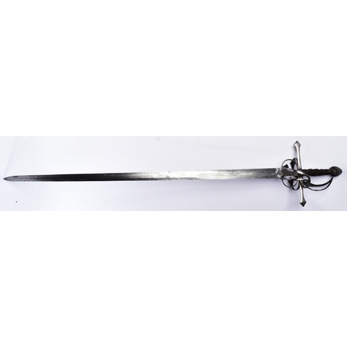 294 - A 16th Century European Rapier sword with a 17th Century blade. Characteristic hilt with looping sid... 