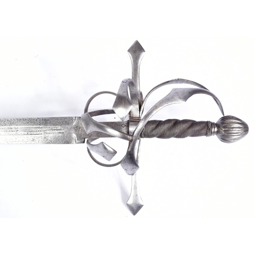 294 - A 16th Century European Rapier sword with a 17th Century blade. Characteristic hilt with looping sid... 