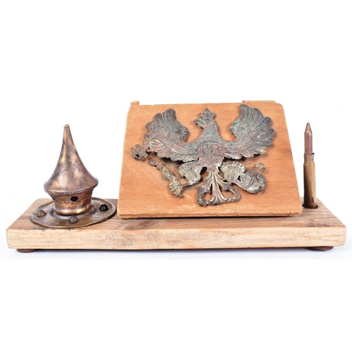 299 - A WWI First World War Imperial German Army trench art desk tidy set fashioned from a an explosive bo... 