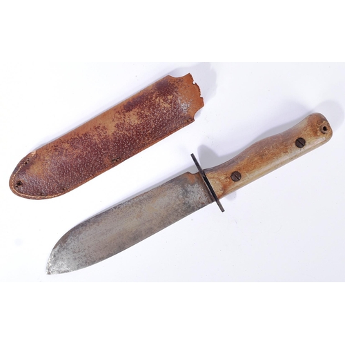 35 - An original WWII Second World War period British Army issued jungle survival knife. The knife made b... 