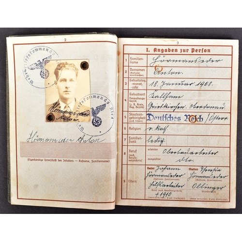 310 - A WWII Second World War Third Reich Nazi German Officers military record ( Wehrpass ) with medals. M... 