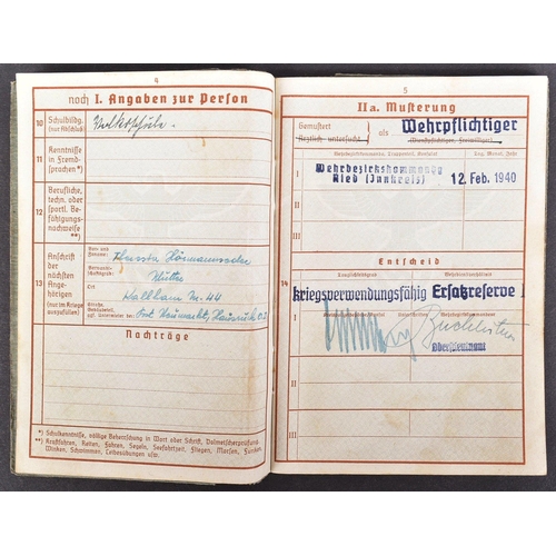 310 - A WWII Second World War Third Reich Nazi German Officers military record ( Wehrpass ) with medals. M... 