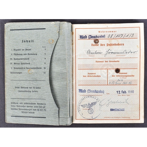 310 - A WWII Second World War Third Reich Nazi German Officers military record ( Wehrpass ) with medals. M... 