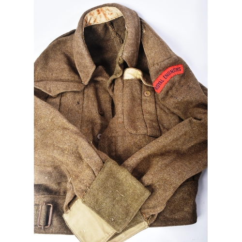 329 - A collection of WWII Second World War British Military items comprising; FAP First Aid Party brodie ... 