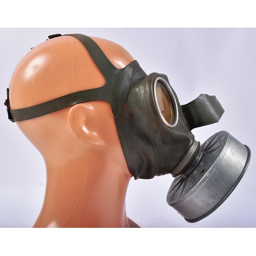 344 - A WWII Second World War Third Reich Nazi German civilian respirator gas mask. Green rubber face shie... 