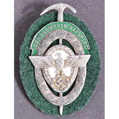 373 - A WWII Second World War Third Reich Nazi German Mountain Police breast badge. National Eagle and Swa... 