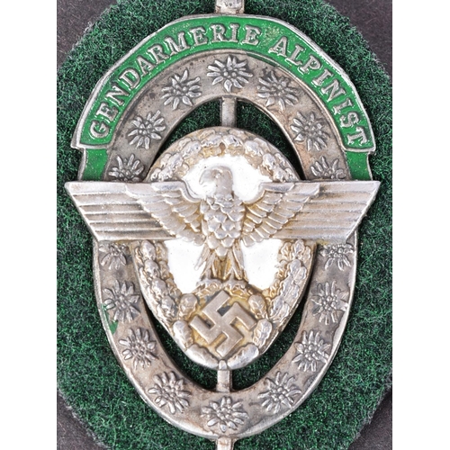 373 - A WWII Second World War Third Reich Nazi German Mountain Police breast badge. National Eagle and Swa... 