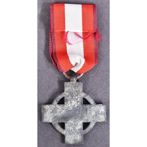 382 - A WWII Second World War Third Reich Nazi German Officers Fire Brigade Cross medal. Red and white ena... 