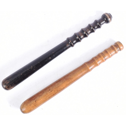 393 - 19th century Victorian police truncheons. Hardwood construction with tapering stem and single ribbed... 