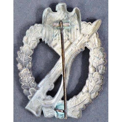 399 - A WWII Second World War Third Reich Nazi German Infantry Assault badge. The badge being a hollow bac... 