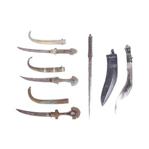 457 - A collection of x5 assorted early 20th Century ethnic / tribal daggers comprising; x3 Moroccan koumm... 