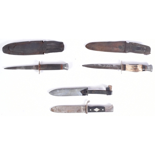 459 - Two WWII Second World War British William Rogers boot knife / hunting knifes and a post war German S... 