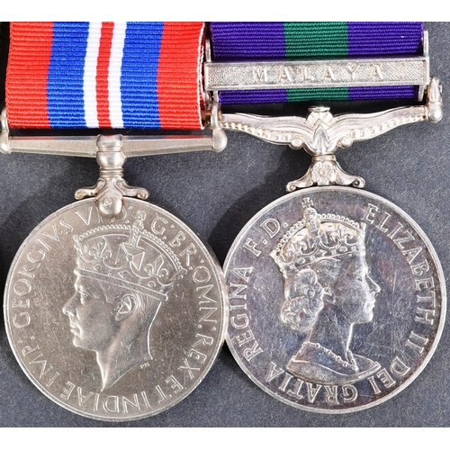 56 - A WWII Second World War medal group along with a post War General Service Medal with Malaya clasp aw... 