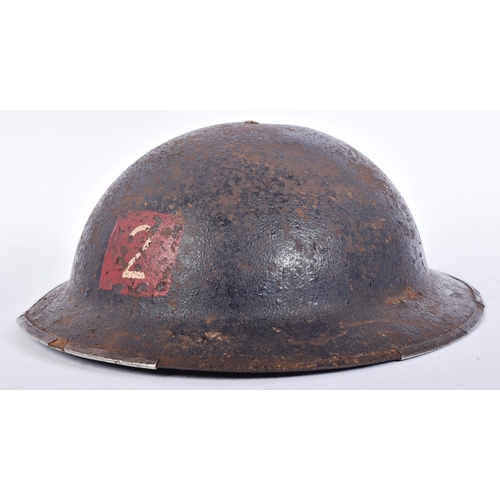 57 - A WWII Second World War British National Fire Service brodie helmet. The helmet of usual form with h... 